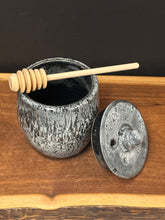 Load image into Gallery viewer, Honey Jar w/Lid and Honey Stir Stick - 14 oz. Wet Ash by Matthew’s Pottery
